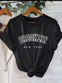 Women black short sleeve T-shirt with Brooklyn New York print and stylish knotted hem design - S / Black