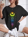 Women's black oversized crew neck T-shirt with rainbow celestial sun and moon print - S / Black
