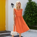 Detail of bright orange sleeveless dress featuring tiered ruffles and A-line silhouette - XS / Orange