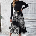 Detail of high neck ribbed sweater and geometric stripe midi skirt with a metallic belt - M / Black
