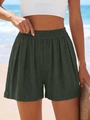 Vue détaillée de la texture en maille côtelée vert olive et taille haute élastique - S / Vert Militaire