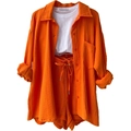 Detailed view of women's orange crinkle fabric shirt and matching drawstring shorts set - S / Orange