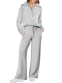 Dettaglio tuta sportiva grigia con felpa mezza zip e pantaloni larghi da jogging - Taglia S / Top E Pantaloni / Grigio chiaro