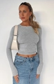 Detail showing the gray slim-fit long sleeve knitted top with fine textured fabric finish - XS / Light Gray