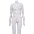 Detail of floral two-piece loungewear with lace trim and ribbed texture on white fabric - S / Top And Bottom / Floral