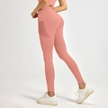 High-waisted peach pink yoga pants with mesh side pockets and heart shape butt lifting cut - Peach Pink