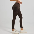 High-waist brown yoga leggings with black mesh pocket for fitness and running - Espresso