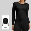 Slim fit long sleeve black yoga shirt for women with high elasticity and athletic design - S / Tops / Black