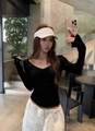 Detail of black V-neck ruched long sleeve top with thumbhole cuffs and slim fit design - One Size / Black