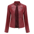 Detailed close-up of quilted pattern and metallic zipper on burgundy faux leather jacket - S / Tops / Burgundy