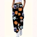 Halloween joggingbroek voor dames met pompoen- en spookprints op zwarte achtergrond - S / Zwart Bedrukt