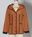 Detail view of terracotta hooded jacket featuring black buttons and contrast trim stitching - S / Caramel color