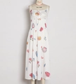 Detail of white summer dress showing colorful floral prints and drawstring chest bow - S / White Floral Print