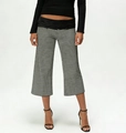 Detail view of high-waisted black and white striped wide-leg trousers with elastic waistband - XL / Black Stripe