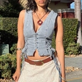Zomers lichtblauw denim vest voor dames met vetersluiting aan de zijkant en V-hals - S / Lichtblauw