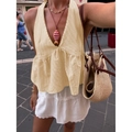 Close-up of yellow checkered halter top with V-neckline and ruffled hem detail - S / Yellow