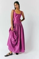 Detail of fuchsia satin maxi dress showing square neck and pleated flowy hemline - S / Purple