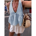 Detail of blue striped halter neck top with ruffled hem and layered summer jewelry - S / Blue