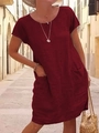 Detail of loose wine red cotton linen dress with practical side pockets and round neck - S / Dark Red
