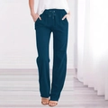Dettaglio dei pantaloni in cotone e lino blu navy con elastico in vita e tasche laterali - S / Verde Pavone