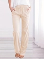 Detail of high-waisted elastic waistband with adjustable drawstring on beige linen pants - Apricot