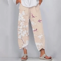 Pantaloni beige in cotone lino a gamba larga con fiori e orlo a tulipano - S / Albicocca