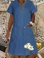 Detail view of V-neck denim dress with side pockets and white daisy floral print - Dark Blue Pastoral Daisy Print