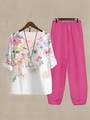 Flat lay of floral short sleeve top and hot pink wide leg pants with overlap detail - S / Top And Bottom / Colorful Floral (Image Color 5)