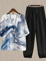 Detail of blue marble print top and black wide-leg trousers with tulip hem design - S / Top And Bottom / Blue And White Marble Print