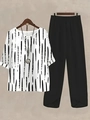Detail of white floral print top with rolled cuffs and black split-hem wide-leg pants - S / Top And Bottom / White with Black Lines (Color 29)