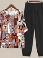Detail of floral dog print short sleeve top and black pants with asymmetric hem - S / Top And Bottom / White/Black (Cartoon Dog Print)