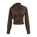 Detail of elegant chocolate brown long sleeve top featuring a large bow and ruched texture - Cocoa Brown