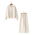 Detail of off-white zip-up bomber jacket and high-waisted wide-leg sweatpants set - S / Top And Bottom / Off White