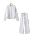 Detail view of light grey cotton knit tracksuit with zipper jacket and wide-leg joggers - S / Top And Bottom / Mixed Grey