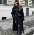 Chic black wool coat with notch lapels and double-breasted buttons in urban street setting - S / Black Long Style