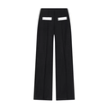 Détail d'un pantalon large noir avec des rabats de poches décoratifs blancs au dos - XS / Pantalons