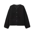 Detailed view of black teddy fleece jacket fabric texture with metallic buttons - XS / Black