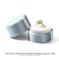 Light blue velvet cylindrical jewelry box with a pearl ring on a white cushion - Sky Blue