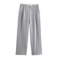 Detail der grauen Hose mit hohem Bund, weitem Bein und weißem Kordelzug am doppelten Bund - XS / Grau