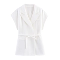 Detail view of a white linen blend double-breasted vest with a tied waist belt and lapel - White Top