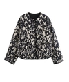 Dettaglio della giacca trapuntata da donna con stampa leopardata, girocollo e bordi neri - XS / Bianco e nero