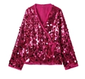 Détail de la veste cache-cœur à paillettes fuchsia avec doublure en satin rose - Rose rouge