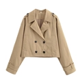 Close-up of double-breasted khaki trench coat with shoulder straps and black buttons - Khaki