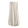 Detail of champagne satin midi skirt showing smooth texture and pearlescent sheen - XS / Off White