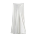 Close-up of white satin high waist maxi skirt showing glossy silk fabric and texture - White