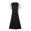 Primer plano de vestido de punto acanalado negro con mangas abullonadas y botones - S / Negro