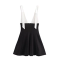 Detail of white V-neck bodice with bow shoulder straps and black A-line skirt - XS / Black & White