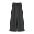 Damen lässige schwarze Weitbein-Hose mit elastischem Kordelzug-Bund auf weißem Hintergrund - XS / Schwarze Hose