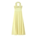 Detail of light yellow halter dress featuring ruched knot bodice and pleated chiffon skirt - S / Creamy Yellow