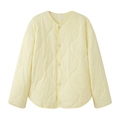 Vue détaillée de la veste matelassée jaune clair avec surpiqûres et boutons-pression - XS / Jaune clair